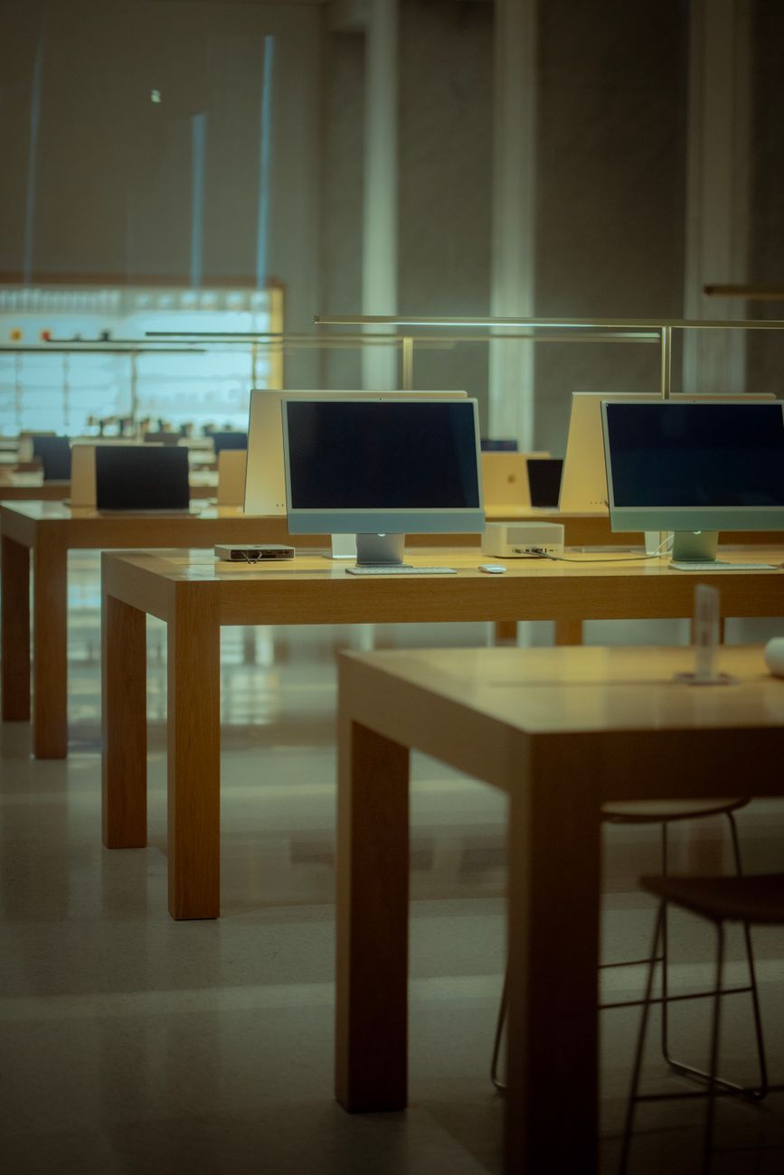 modern computer store interior with desks