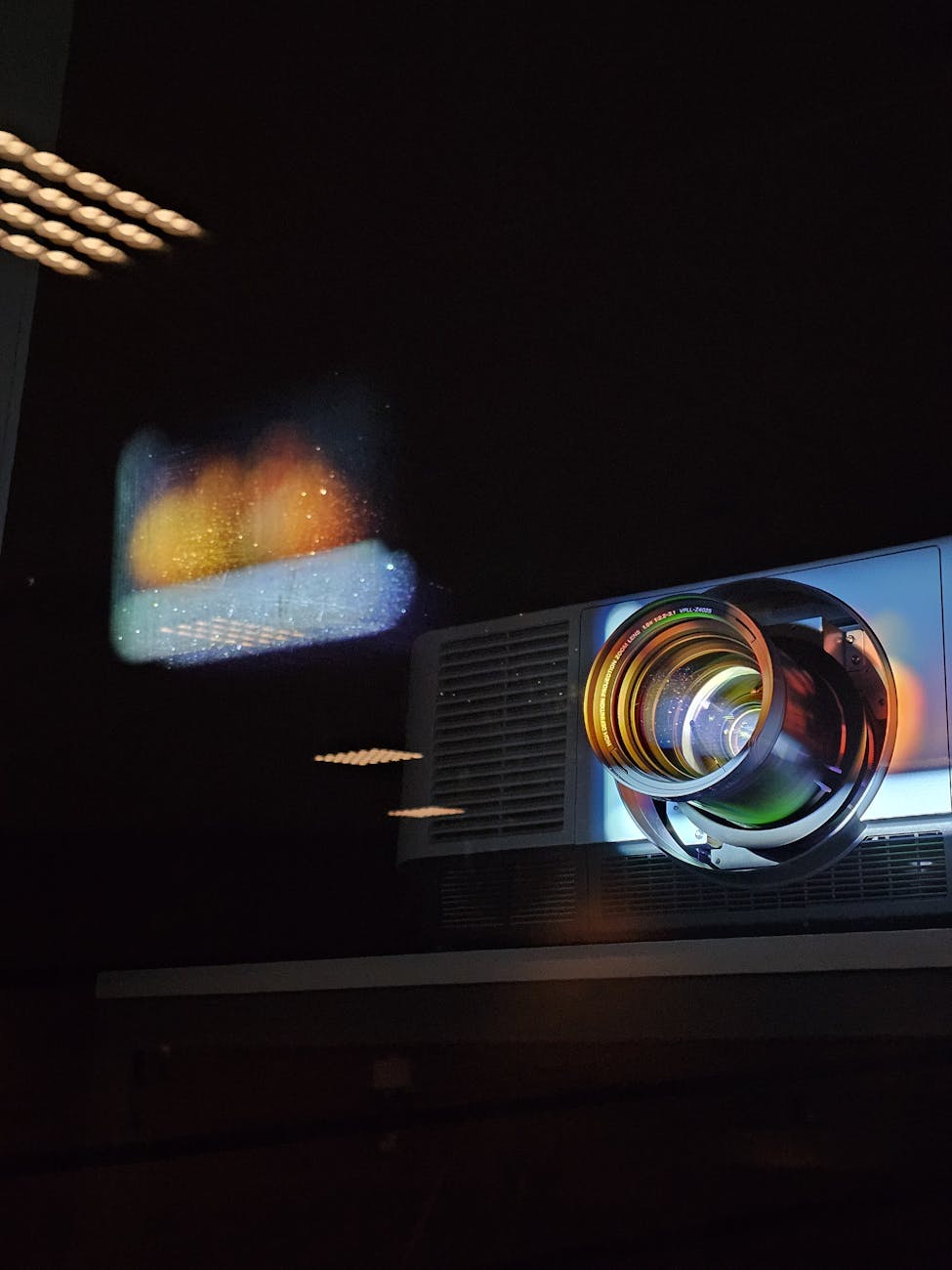 dynamic light projection on wall with projector lens
