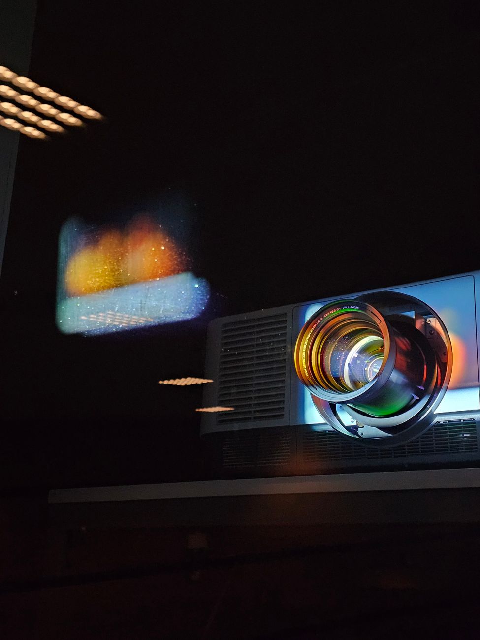 dynamic light projection on wall with projector lens